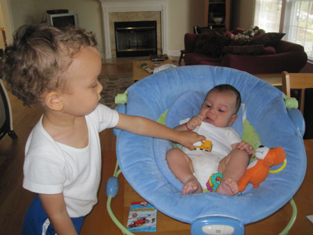 Jason playing cars with Robert